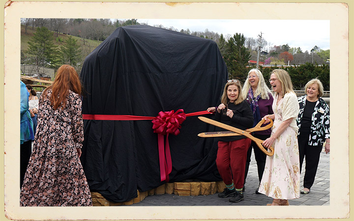 FHAMC Board Members Cutting Ribbon For Sculpture Unveiling